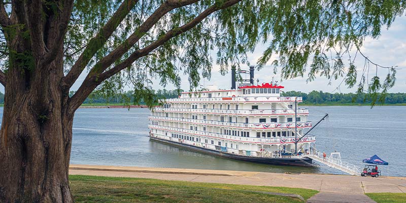 American Cruise Lines boat docked along the scenic Ohio River