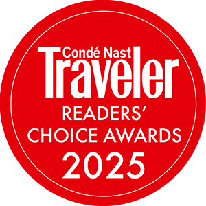 Red circular badge with "Condé Nast Traveler Readers' Choice Awards 2025" in white text, awarded to American Cruise Lines