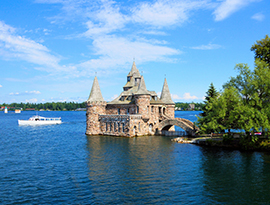 Small boat on Lake Ontario near Boldt Castle, an American Cruise Lines excursion in the Thousand Islands region of New York. 