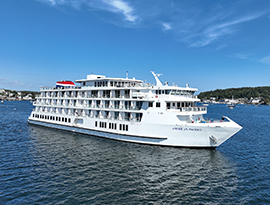 American Cruise Lines ship, the American Patriot, on the calm waters of Lake Michigan.