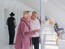 Two women admire art in in the Milwaukee Art Museum, on an American Cruise Lines excursion.