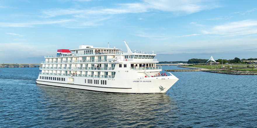 An aerial view of American Ranger, an American Cruise Lines Patriot Class small cruise ship sailing along the Hudson River.