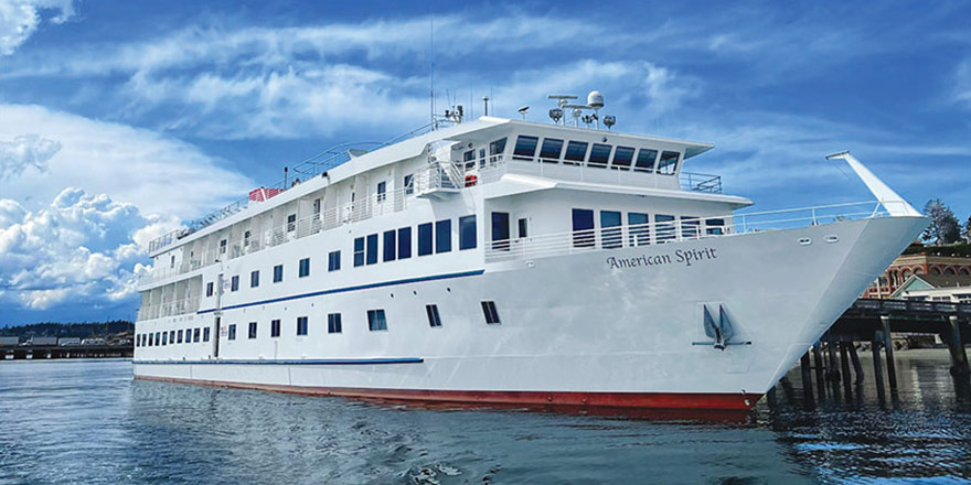 American Spirit, an American Cruise Lines Independence Class small cruise ship docked along Puget Sound in Port Townsend. 